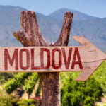 Moldova wooden sign with winery background